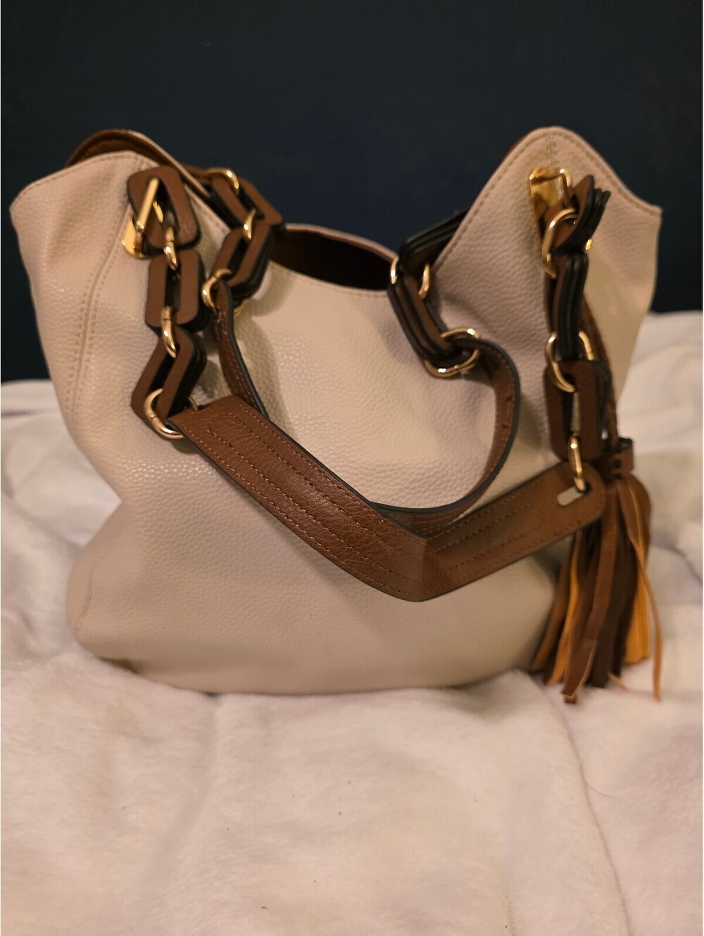 Cream hobo shoulder bag with tassel